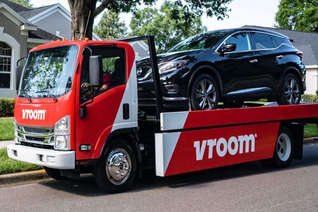 Vroom truck delivers a car